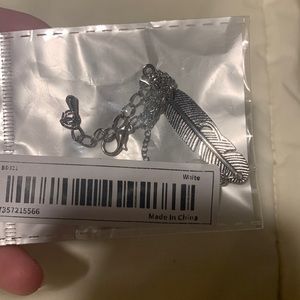 New with tags feather braclet